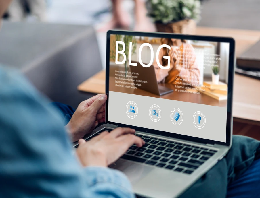 Woman ues laptop computer with social media online content, freelance worker, working online, content creator, blogger, technology, website, woman reading blog online on computer at home